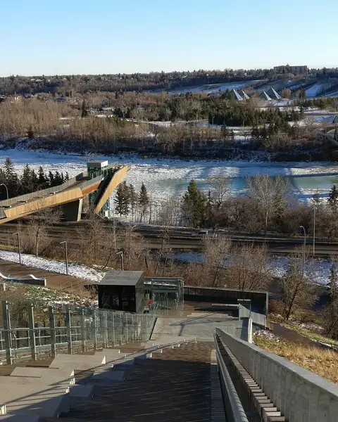 View from the 100 Street Funicular over the snowy river valley, the Low Level Bridge and the North Saskatchewan River